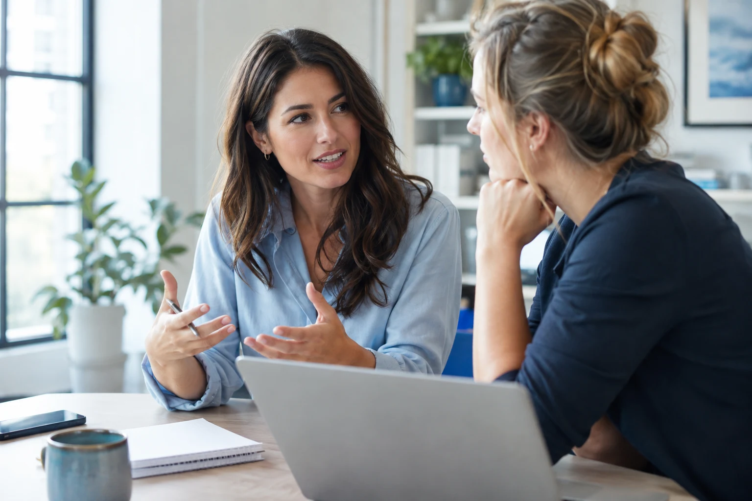 Strategist discussing research with a colleague